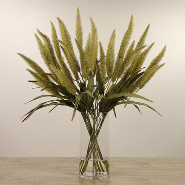 تنسيق نبات البينيسيتوم الاصطناعي في مزهرية زجاجية